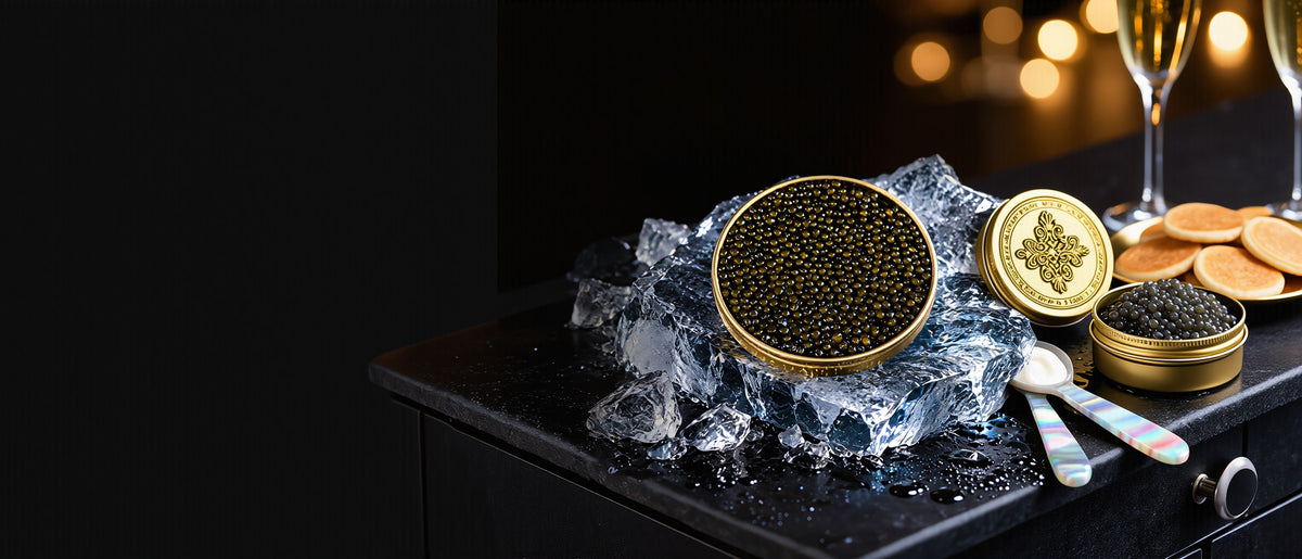 Empero caviar packages on ice with mother-of-pearl spoons and blinis