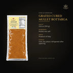 Grated cured mullet bottarga details – mullet roe and salt, product of Italy