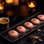Dubai Chocolate mini mochi served on a black plate with espresso