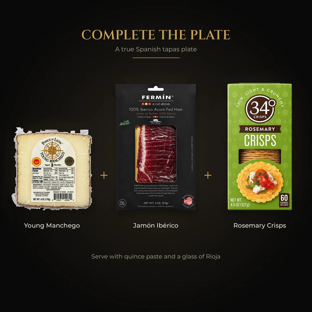 Spanish tapas plate: young Manchego, jamón ibérico and rosemary crisps